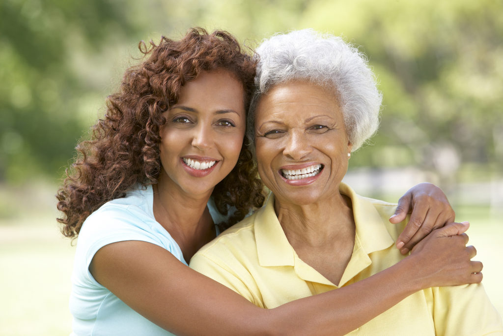 adult woman with senior mother